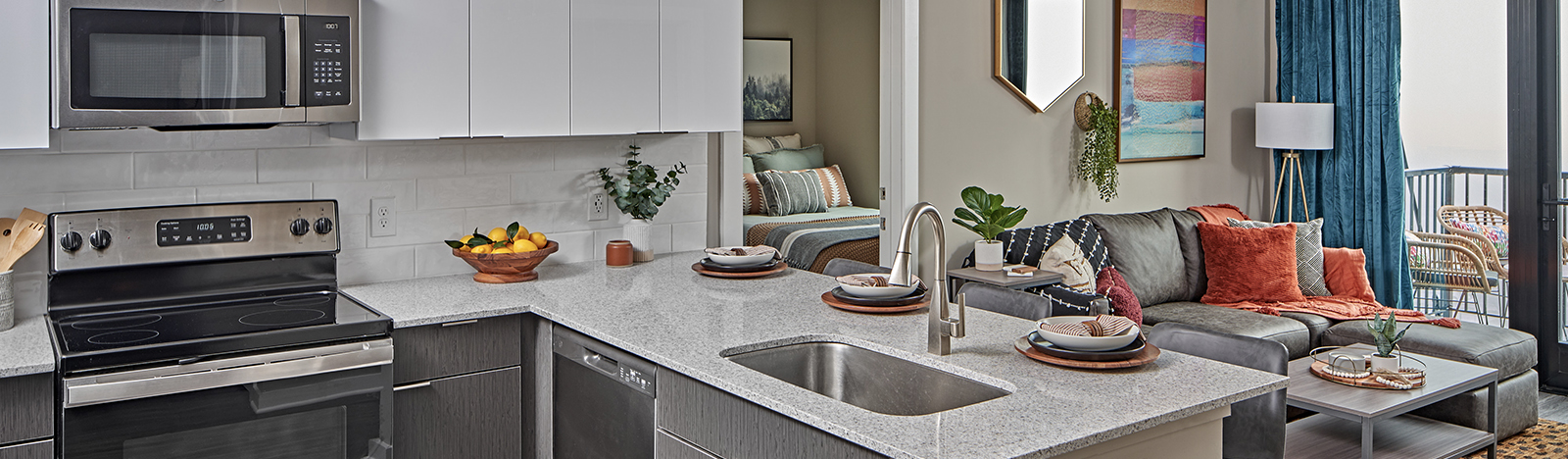 View of apartment kitchen and living room