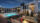 Resort style pool and a fire pit with seating